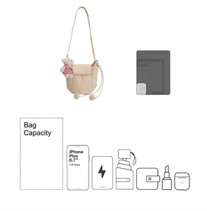Detail view of beige bucket bag capacity with size comparison to phone and tablet