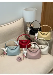 Lindy-style leather handbags in six vibrant colors with cute white bunny charms