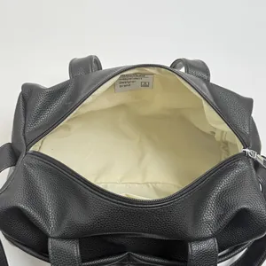 Large capacity black pebble grain tote bag with wide strap and zip closure