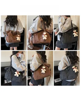 Detail shots of large tote bags in brown and black with plush bear charm and strap