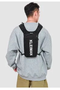 Detail of breathable mesh shoulder straps and adjustable chest buckle on running vest bag