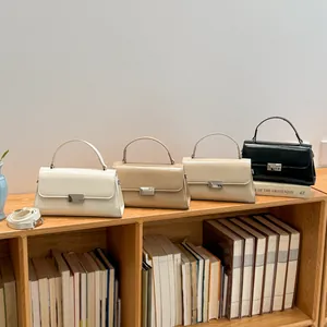 Elegant glossy leather handbag for women available in white, khaki, beige, and black