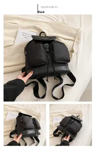 Detail view of black nylon and leather backpack with 3-angle display and CAMAI logo
