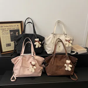 Retro large-capacity tote bags in four colors with cute teddy bear charms and shoulder straps
