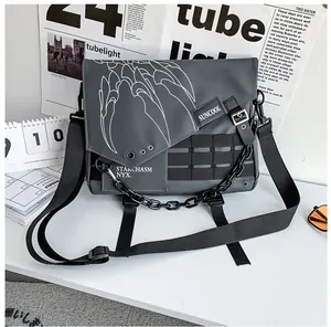 Close-up of waterproof techwear crossbody bag with metal chains and nylon straps