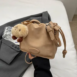 Women Retro Pleated PU Leather Bucket Bag Minimalist Crossbody Shoulder Bag With Plush Charm Drawstring Casual Daily Bag