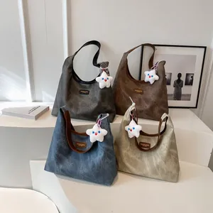 Vintage canvas tote bag collection with star pendant in grey, brown, blue and beige colors