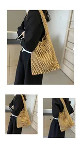 Close-up of handmade woven mesh tote bag with detailed cotton rope knots and lining
