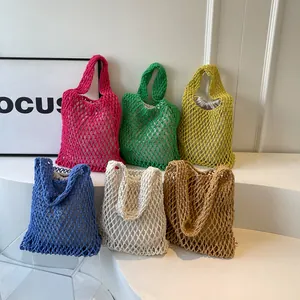 Handmade woven cotton rope tote bags in six vibrant colors for beach vacations