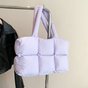 Quilted lavender puffer tote bag with wide straps and spacious interior for daily use