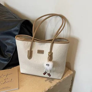 Women Fashion Cartoon Embossed PU Leather Tote Bag Large Capacity Casual Shoulder Bag With Plush Monster Pendant Accessory