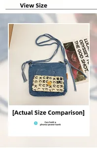 Detailed view of blue denim bucket bag showing interior space for phone and power bank