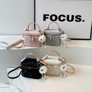 Fashionable bucket handbag for women with silk scarf handle and plush pendant decoration