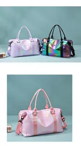Detail view of large holographic travel bags in purple, black, and pink colors