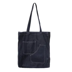Large capacity dark blue denim tote bag with external pockets and white contrast stitching