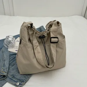 Japanischer Stil Große Kapazität Damen Tote Bag Kordelzug Segeltuch Nylon Umhängetasche Lässige Pendler Schultasche