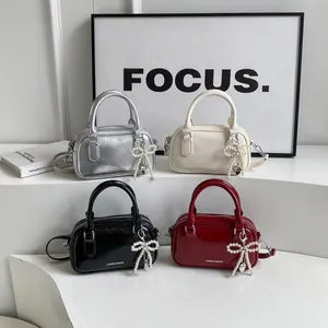 Women's Boston handbag set in silver, white, black and red with pearl bow charm