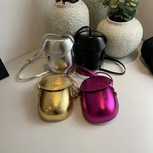 Minimalist metallic saddle crossbody bags in silver, black, gold and purple colors