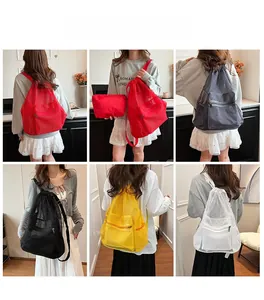 Mesh drawstring backpack shown on models in red, dark grey, black, yellow and white colors