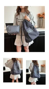Detail of grey breathable mesh drawstring backpack with matching storage pouch
