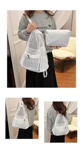 Detail of white mesh drawstring backpack with matching zip pouch and adjustable straps