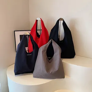 Minimalist large capacity nylon tote bags in four colors with shoulder strap and logo