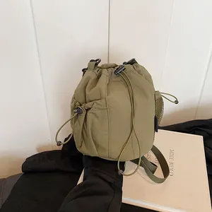 Women Lightweight Nylon Drawstring Bucket Bag Minimalist Crossbody Shoulder Bag With Side Mesh Pocket For Travel Daily Casual