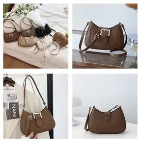 Détails du sac hobo rétro en cuir avec boucle argentée et texture grainée