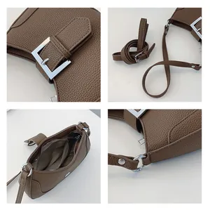 Détails du sac en cuir marron montrant la boucle, la doublure et la bandoulière