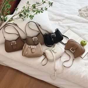 Sacs à bandoulière rétro texture lychee en six couleurs avec boucle métal et fines lanières