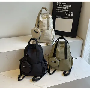 Sacs à dos en nylon minimalistes blanc, noir et vert avec mini porte-monnaie et cordons de serrage