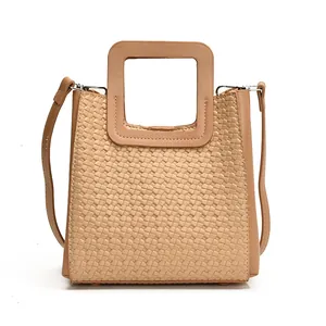 Sac seau tissé beige rétro avec poignées carrées ajourées et bandoulière réglable