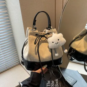 Women Korean Style Patchwork Canvas Leather Bucket Backpack Casual Handbag Shoulder Bag With Plush Cloud Pendant Drawstring Bow Commuting Bag