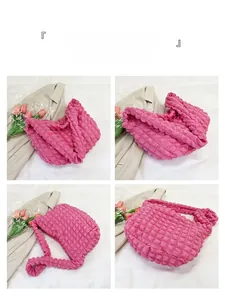 Detail view of fuchsia popcorn texture fabric and seamless shoulder strap design