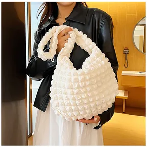 Minimalist white puffy cloud bag with quilted texture and ruched handle for women