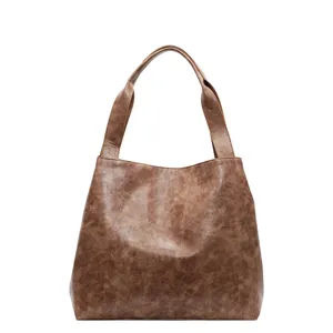 Vintage brown PU leather tote bag with wide shoulder straps for daily commute use