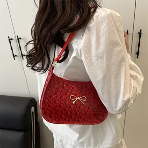 French chic red shoulder bag with 3D bubble texture and golden bow decoration
