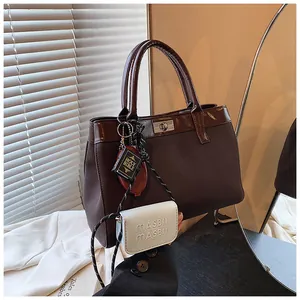 Dark brown large capacity tote bag in PU leather with mini pouch and book charm