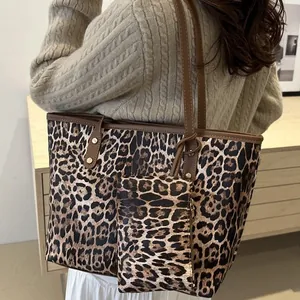 Stylish leopard print tote bag with small pouch and gold rivets for women's casual use