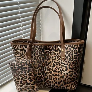 Large leopard print tote bag set with matching pouch and brown leather straps for women