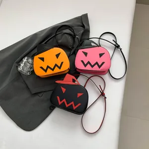 Halloween pumpkin crossbody bag in orange pink and black with wizard hat design