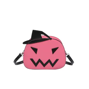 Pink pumpkin crossbody bag with black wizard hat and jack-o-lantern face for Halloween
