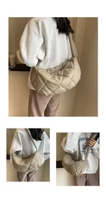 Detailed view of khaki quilted dumpling bag with large diamond stitching and wide strap