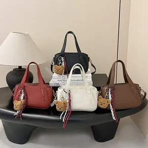 Chic lychee pattern handbags in black, red, cream, and brown with cute bear charms