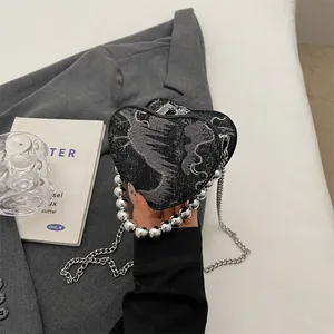 Borsa a tracolla chic a forma di cuore in jacquard grigio con manico di perle