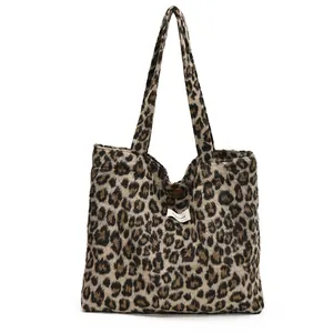 Chic leopard print wool tote bag with button closure and comfortable shoulder straps
