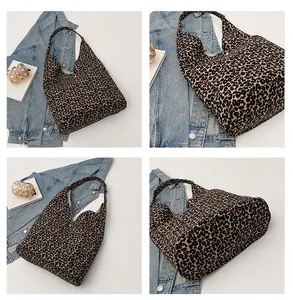 Detail view of large leopard print canvas tote bag showing structure and texture
