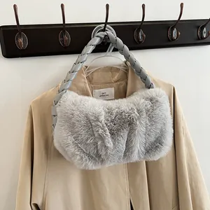 Plush faux fur handbag in light grey with a braided handle for autumn and winter