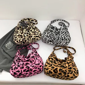 Vintage leopard print woven tote bags in four colors with adjustable shoulder straps