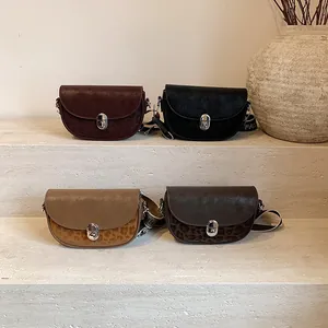 Retro matte saddle bags with leopard print details and wide fashion straps